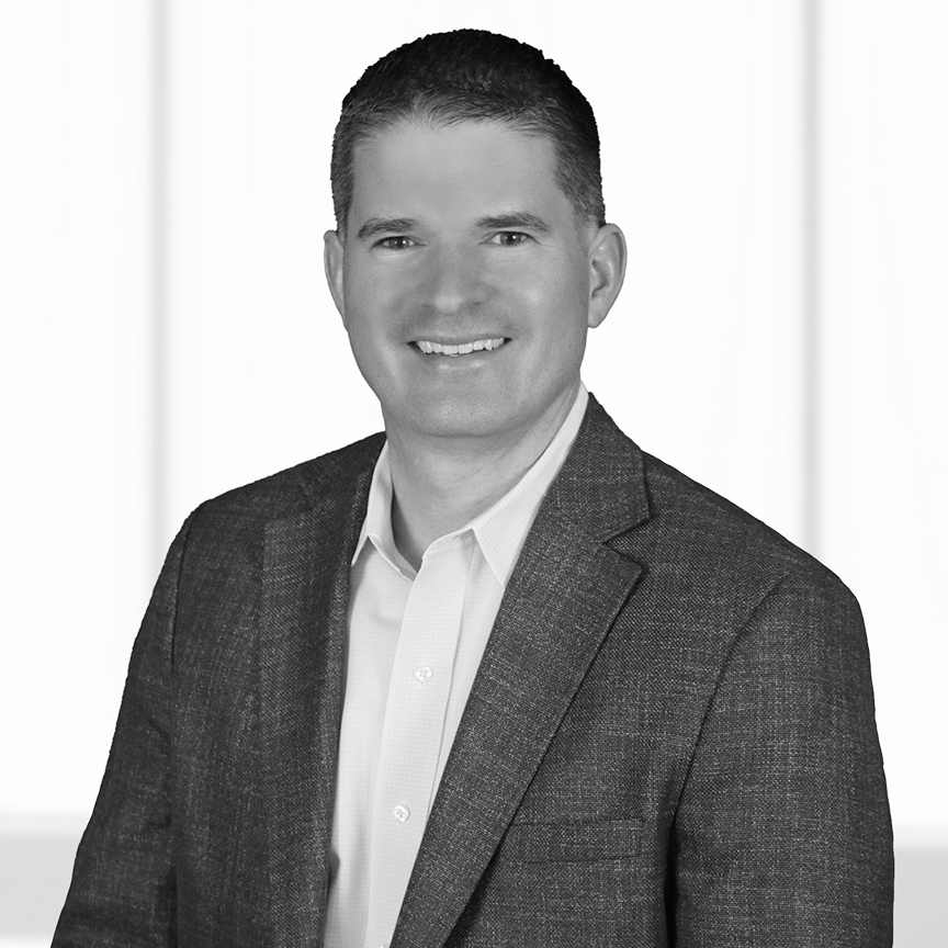 headshot of tom brennan