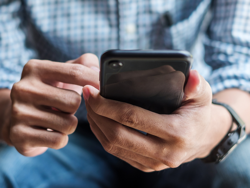 hands holding phone