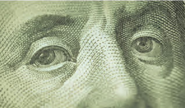 Close-up of Benjamin Franklin's eyes from the U.S. hundred-dollar bill engraving
